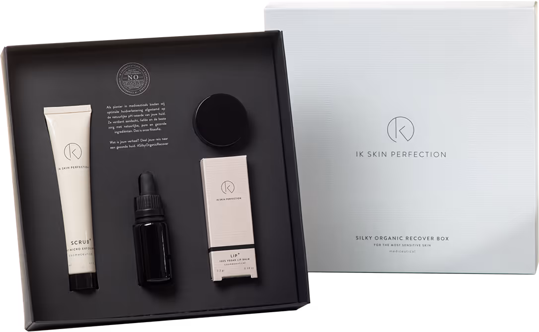 Open IK Skin Perfection Silky Organic Recover Box showing skincare products inside on a black tray.